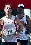 Describe the picture: Marathon Runners